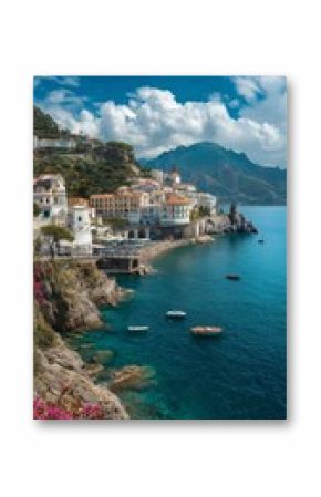 Stunning Coastal View of a Picturesque Town Situated by the Sea Under a Blue Sky With Fluffy Clouds.