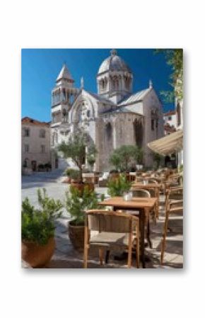 Enjoying a Sunny Afternoon at a Historic Outdoor Cafe Near the Cathedral in Split, Croatia.