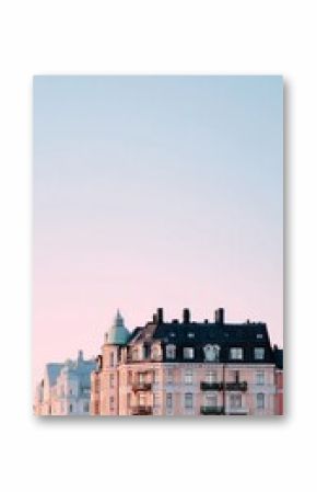 Beautiful Historic Buildings With Architectural Details Against a Clear Sky at Sunset in a City.