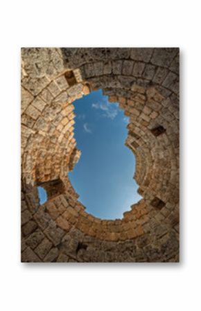 Interior view of ancient Perge tower ruins looking up to sky