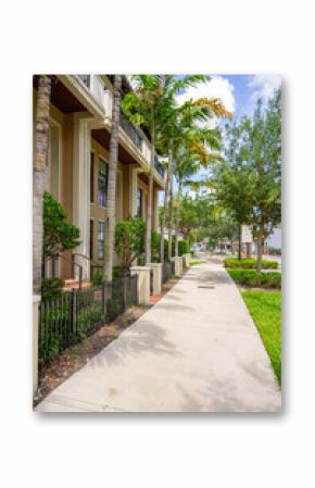 Sidewalk Miami Lakes Florida. View of mixed use residential and commercial business buildings on Main Street 2025