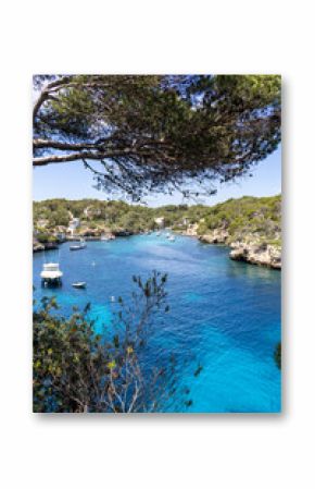 Bay of Cala Figuera on Mallorca island with sailboats holiday by the sea portrait format in Spain