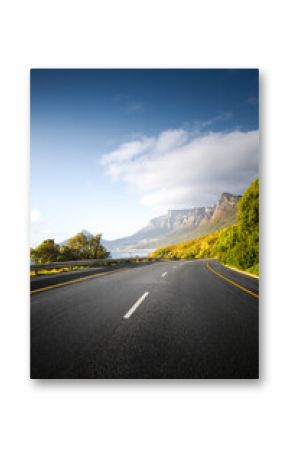 Scenic Coastal Road through Cape Town Suburbs with Mountains and Ocean View