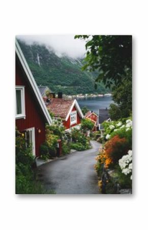 Charming Coastal Village With Colorful Houses and Lush Greenery Beside a Tranquil Fjord.
