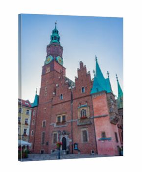 Sunrise view of town hall at Rynek, the picturesque square in ce