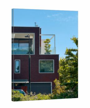 Modern urban architecture with balcony plants. Contemporary building facades and geometric design,
