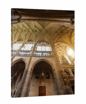 Interior of Saint Vitus Cathedral with gothic architecture.