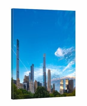 A stunning morning view of the slimmest and tallest skyscrapers on Billionaires Row, rising dramatically above Central Park.