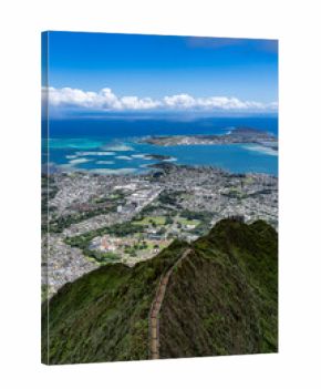 Haiku Stairs (Stairway To Heaven), Honolulu, Oahu, Hawaii. Koʻolau Range, shield volcano. Kāneʻohe Bay is argest sheltered body of water in the main Hawaiian Islands. This reef-dominated embayment