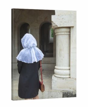 Caucasian girl in the headscarf in outdoor.