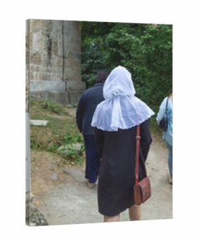 Caucasian girl in the headscarf in outdoor.