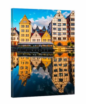 Old houses and street in Gdansk on the Motlawa river