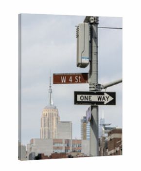 view of west 4th street (w 4 st) in manhattan with skycraper background view nyc new york city street scene one way sign signage travel greenwich village