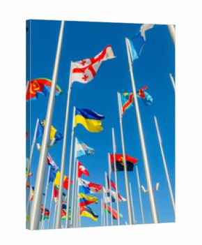 Georgian and Ukrainian flags waving together with the many international flags like DR Congo, Bosnia, Eritrea, Panama, Argentina, Angola, in Doha, Qatar.