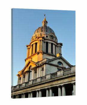 London Old Royal Naval College dome clock tower building bathed in golden light, showcasing neoclassical architecture and heritage