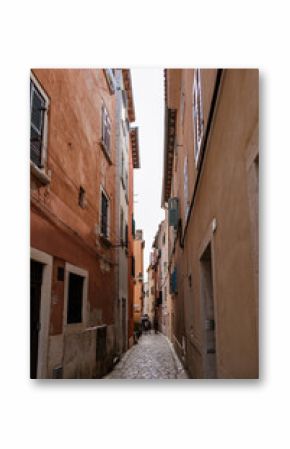 Charming narrow streets of Rovinj, Croatia with colorful buildings and cobblestone paths