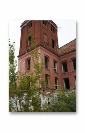 Abandoned, neglected and overgrown building