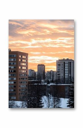 Orange Sunset Over Snowy City Skyline