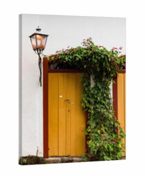 Colorful door in the historic center of Paraty. World Heritage Site, Rio de Janeiro, Brazil, Portuguese colonial and Brazilian imperial city where the sea invades at high tide