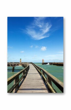 Wooden boardwalk to the beacons at the harbor entrance of Fecamp, Normandy France