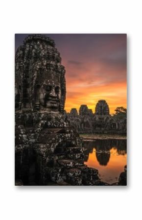 Ancient Bayon Temple Faces at Sunset: Dramatic Khmer Architecture