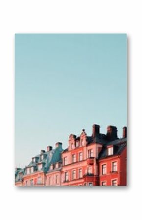 Colorful Historic Buildings Under a Clear Sky During Sunset in a European City