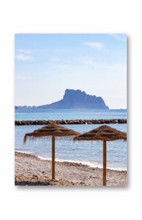 View from La Roda beach in Altea to turquoise Mediterranean sea and Rock of Ifach. Altea town, Alicante province, Spain
