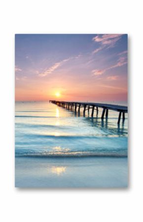 Endless Wooden Pier with wooden planks Stretching Over the Mediterranean Sea at a Vibrant Summer Sunrise