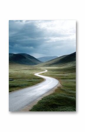Single-track road in vast tundra, quiet atmosphere