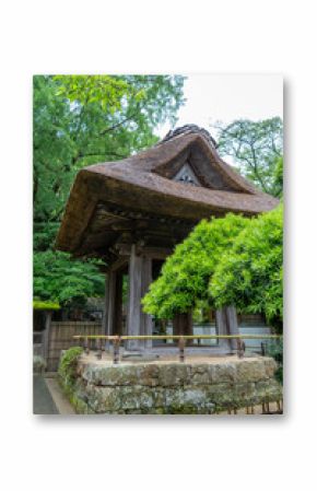 Hokoku-ji shrine bell tower surrounded by trees in Kamakura, Japan