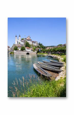 Aarburg city on the river Aare with church, fortress and boats portrait format in Switzerland