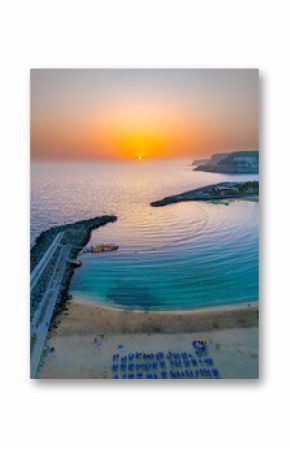Hi Quality Aerial image of Playa De Amadores beach at Sunset, Puerto Rico on the island of Gran Canaria, Canary Islands, Spain July 2025.