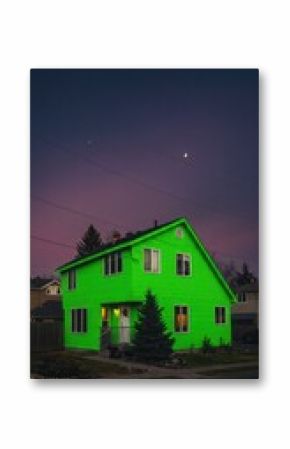 Neon green house at twilight