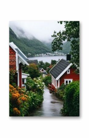 Picturesque Village Pathway Lined With Vibrant Flowers and Charming Houses in Norway During a Misty Morning