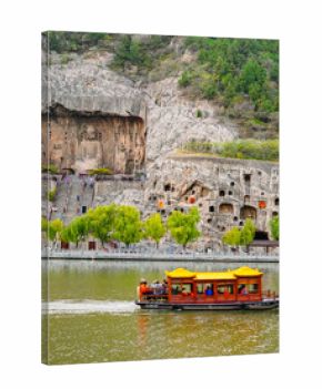 View of the historic Longmen Grottoes along the Yi River in Luoyang, China.