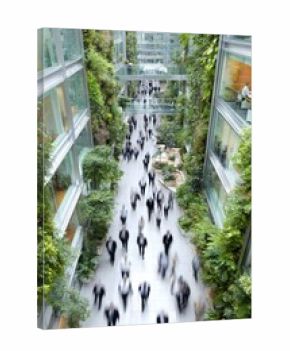 Business People Walking in Modern Office Building with Green Walls from Above Blurred Motion