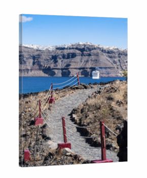 Scenic Volcanic Trail with Rope Barrier Overlooking Santorini Caldera, Cruise Ship, and Distant Fira Village