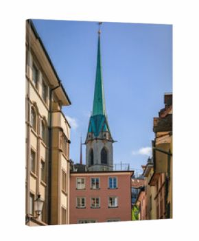 Historic Old Town street with Predigerkirche church spire in Zurich, Switzerland
