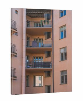 Residential apartment balconies with railings.