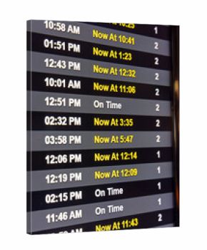 An airline schedule digital display showing delayed and cancelled flights