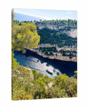 Calanque d'en vau, france, boat navigating blue mediterranean sea