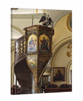 Elevated church pulpit with ornate gold decorations and painted panels depicting saints or biblical scenes, in The Panagia Tourliani monastery in Mykonos 