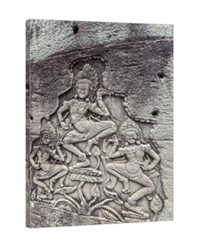 An intricate and well-preserved bas-relief carving shows celestial Apsara dancers in motion on a weathered stone wall, showcasing ancient Khmer artistry at a temple in Siem Reap, Cambodia.