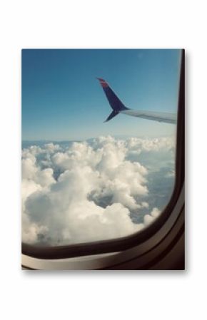 view of the sky and clouds from airplane window