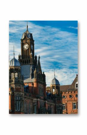 Brick Building with Clock Tower and Blue Sky in York, North Yorkshire, UK.