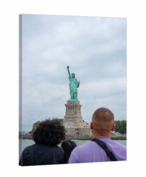 Statue of Liberty, New York City, United States. Tourists, cameras and phones.