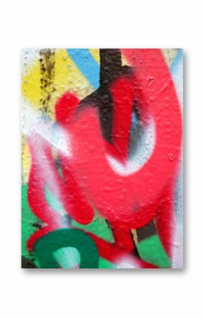 Detail of a wall covered with layers of graffiti.