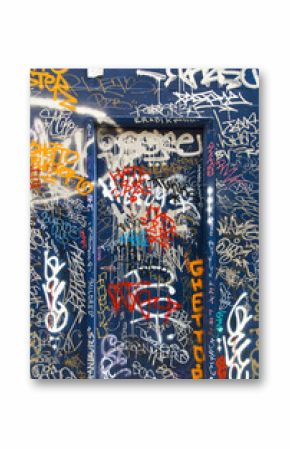 Blue doorway with graffiti tags