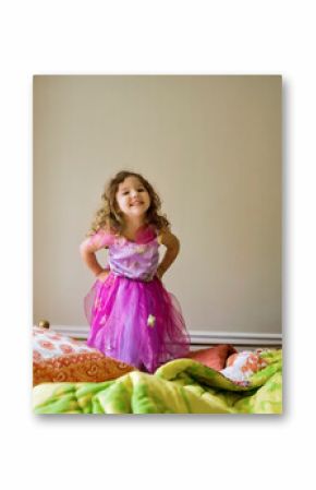 Preschooler girl poses for the camera in her bedroom  Washington, District of Columbia, United States of America