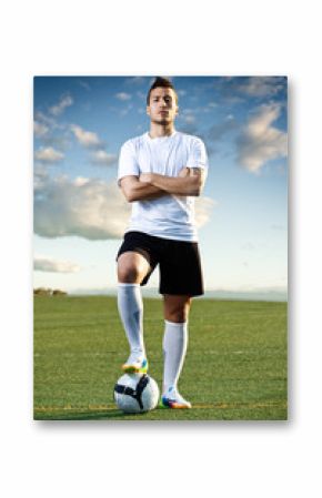 Soccer player with ball, outdoors